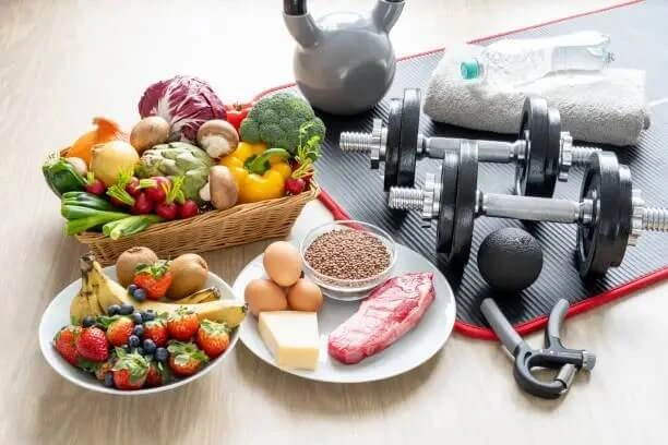 Effortless Weight Loss Formula healthy food and dumbbells