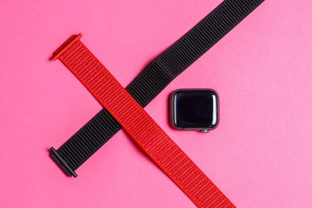 Close-up of a smartwatch with interchangeable red and black nylon bands, highlighting options to replace Fitbit watch bands for style and comfort.