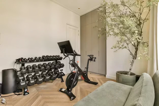 Compact home workout equipment in a space-saving home gym setup.